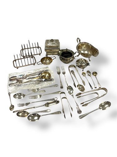 Lot 232 - A collection of silverware including toast...