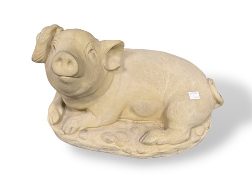 Lot 655 - A stone pig ornament, 40cm wide approx