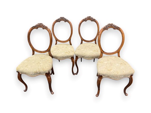 Lot 586 - A set of four balloon back chairs with flower...
