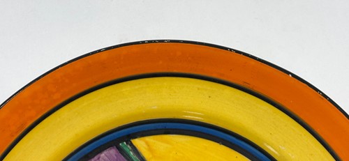 Lot 27 - A Clarice Cliff Fantasque 'Football' pattern side plate