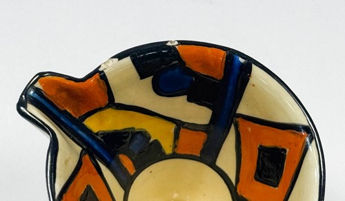 Lot 29 - A Clarice Cliff Bizarre 'Diamond' pattern hot water jug, cream jug and sugar