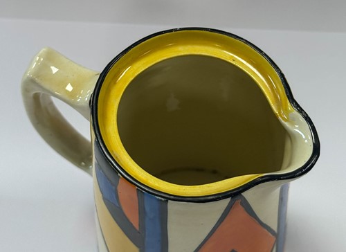 Lot 29 - A Clarice Cliff Bizarre 'Diamond' pattern hot water jug, cream jug and sugar