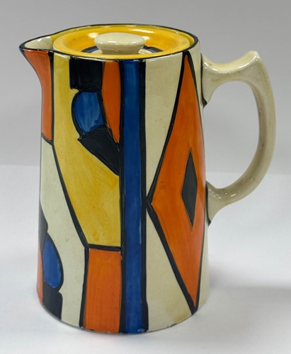 Lot 29 - A Clarice Cliff Bizarre 'Diamond' pattern hot water jug, cream jug and sugar
