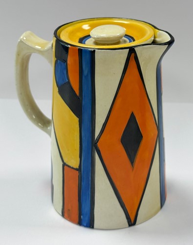 Lot 29 - A Clarice Cliff Bizarre 'Diamond' pattern hot water jug, cream jug and sugar