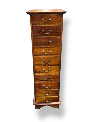 Lot 613 - Tall chest of 10 drawers set with brass swan...
