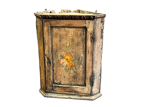 Lot 737 - A provincial painted corner cupboard decorated...