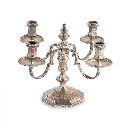 Lot 558 - An Elizabeth II cast silver 4 branch, 4 light candelabra