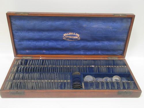 Lot 125 - Mahogany cased optician's lenses