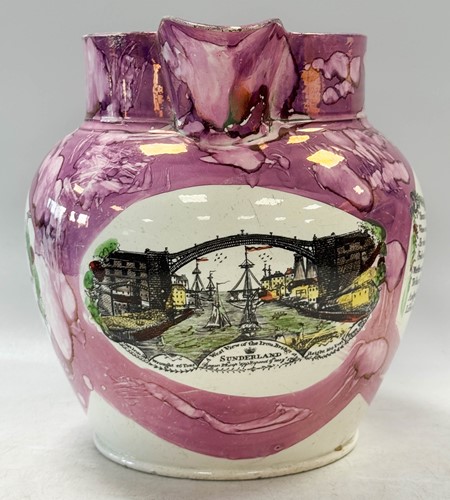Lot 23 - A Sunderland lustre jug, the body printed with...