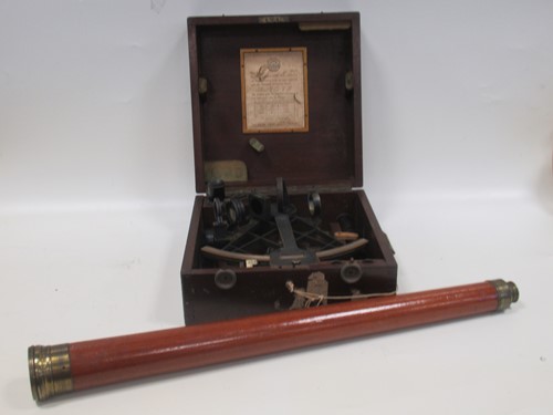 Lot 124 - A cased sextant and brass telescope