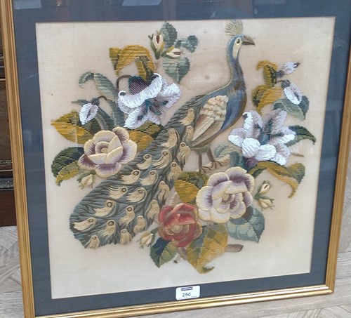Lot 250 - 19th century framed beadwork panel, peacock...
