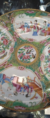 Lot 22 - A group of three Canton famille rose plates,...