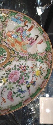Lot 22 - A group of three Canton famille rose plates,...