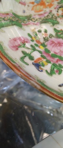 Lot 22 - A group of three Canton famille rose plates,...