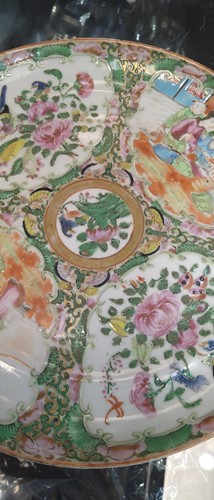Lot 22 - A group of three Canton famille rose plates,...