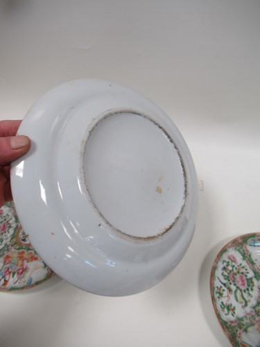 Lot 22 - A group of three Canton famille rose plates,...