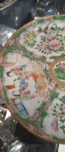 Lot 22 - A group of three Canton famille rose plates,...