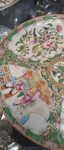 Lot 22 - A group of three Canton famille rose plates,...
