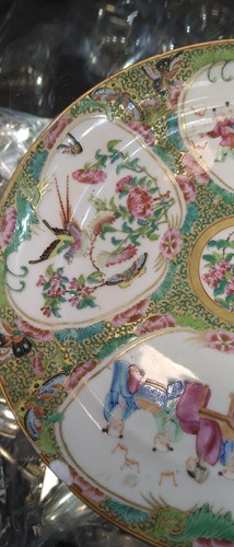 Lot 22 - A group of three Canton famille rose plates,...