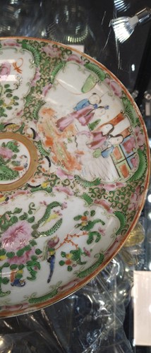 Lot 22 - A group of three Canton famille rose plates,...