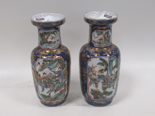 Lot 62 - A pair of small Chinese vases of baluster form,...