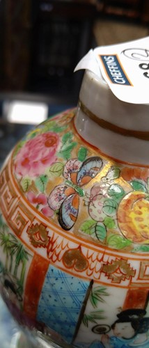 Lot 68 - A pair of small Canton vases of baluster form...