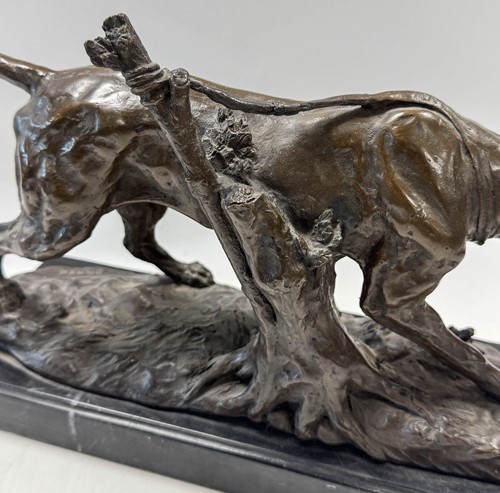 Lot 594 - After Antoine Louis Barye (1795-1875), a bronze model of a hunting dog, 20th century