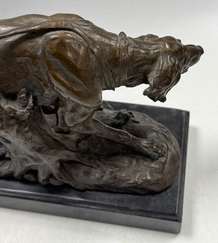 Lot 594 - After Antoine Louis Barye (1795-1875), a bronze model of a hunting dog, 20th century