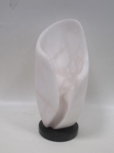 Lot 211 - A modern shell shaped alabaster sculpture, on...
