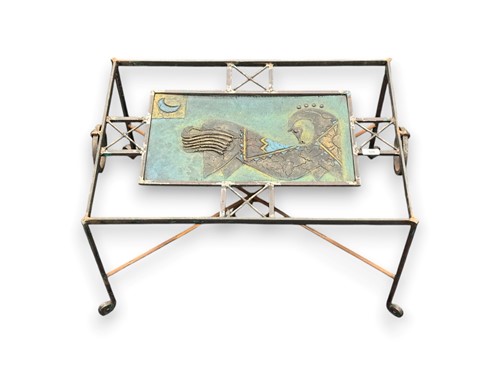 Lot 705 - A modern black painted metal coffee table with...