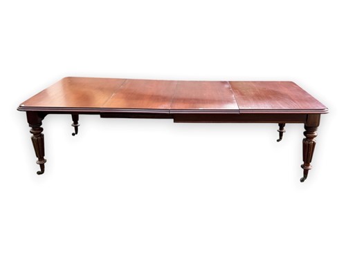 Lot 790 - A Victorian mahogany extending dining table,...