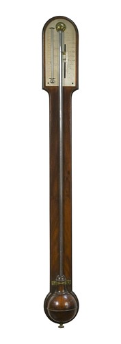 Lot 553 - A George III mahogany stick barometer