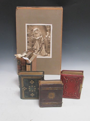 Lot 245 - Books and family carte de visite photographs:...
