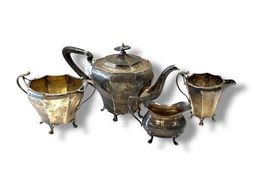 Lot 362 - A silver three-piece tea set together with a...