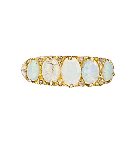 Lot 52 - An opal and diamond carved half hoop style ring