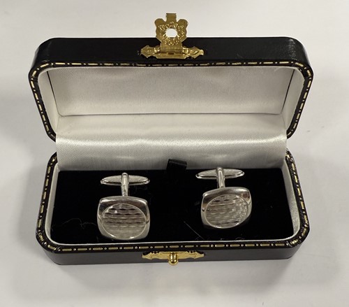 Lot 304 - Dunhill - A pair of silver collar stays and two pairs of silver cuff links