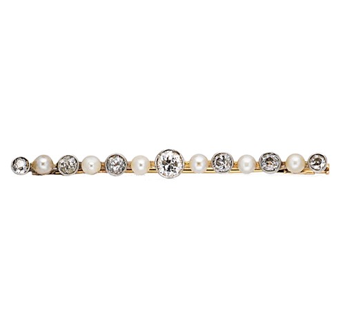 Lot 44 - An early 20th century diamond and pearl bar brooch
