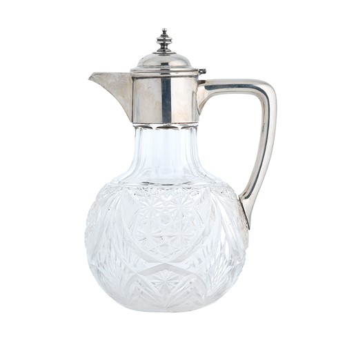 Lot 509 - An Edward VII silver mounted glass claret jug