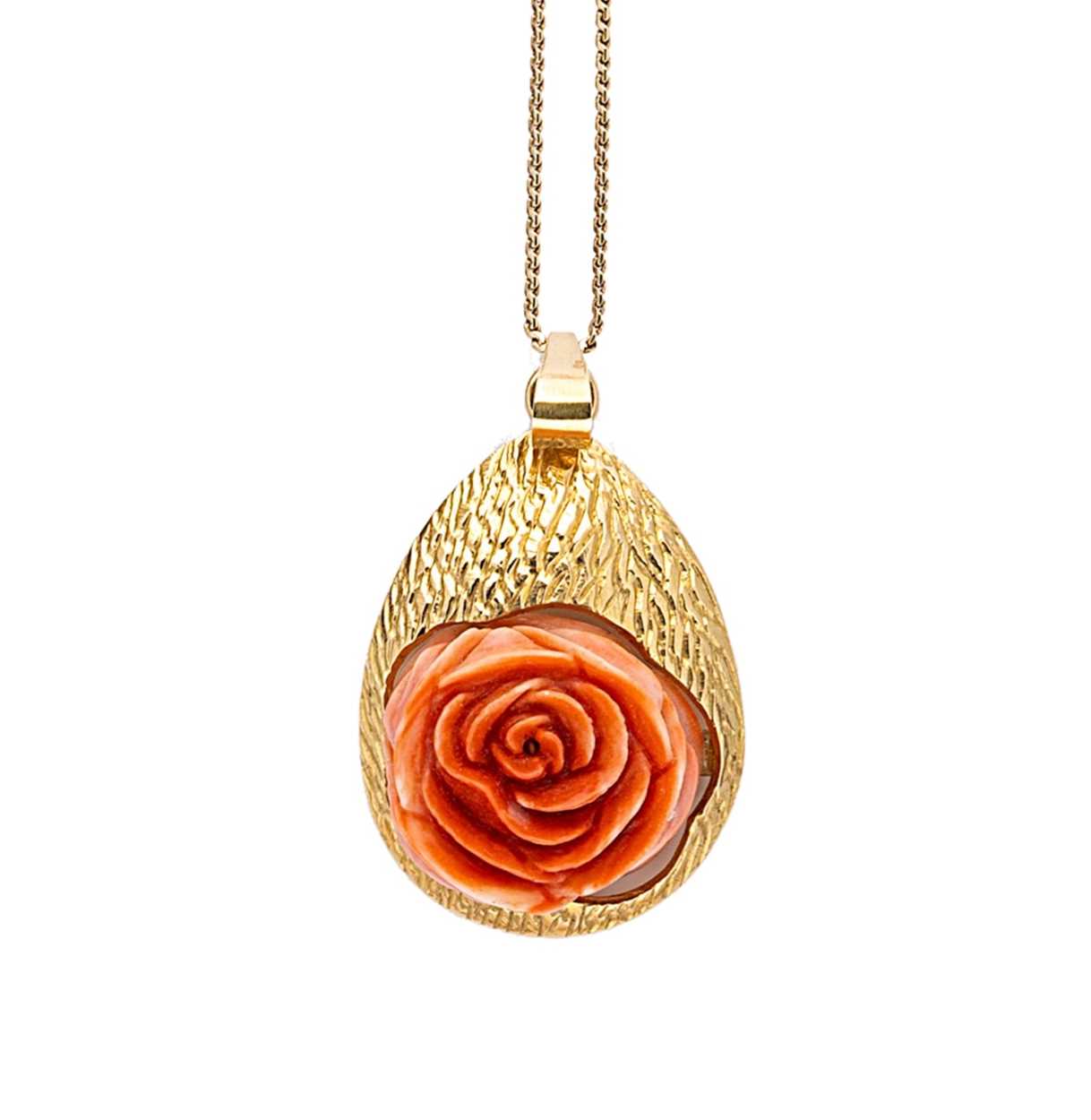 Lot 86 - A carved coral pendant and chain