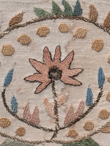 Lot 424 - Framed Suzani embroidery fragment on linen, 17...