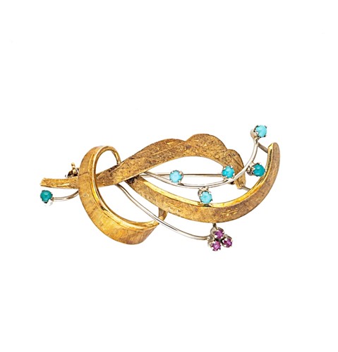 Lot 32 - A turquoise and ruby brooch