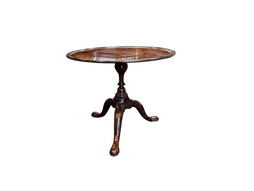 Lot 754 - A 19th century mahogany tripod table, 51 x 64cm