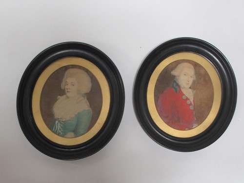 Lot 157 - A pair of variegated red and white marble...