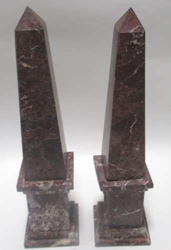 Lot 157 - A pair of variegated red and white marble...
