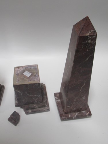 Lot 157 - A pair of variegated red and white marble...