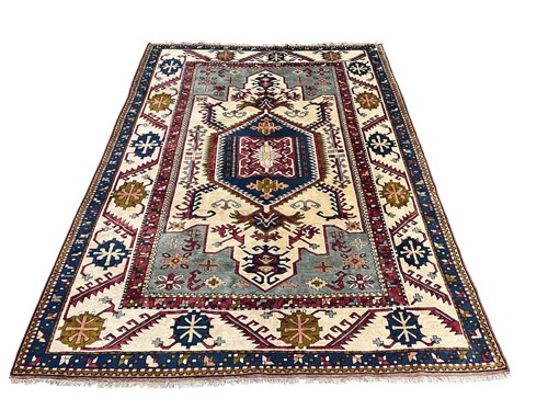 Lot 559 - A contemporary hand-knotted Kazak style rug...