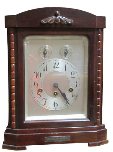 Lot 139 - A 1920s chiming mantle clock, the silvered...