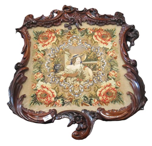 Lot 149 - A Victorian needlework, depicting a lady in a...