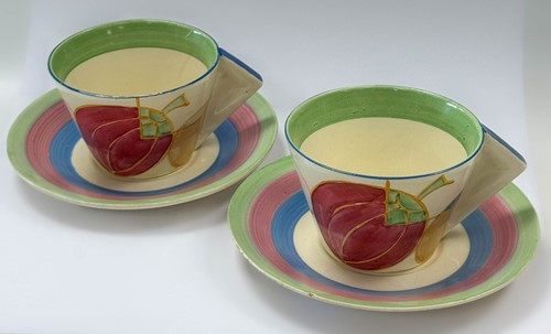 Lot 28 - Clarice Cliff Bizarre, a pair of 'Pastel Melon' conical cups and saucers