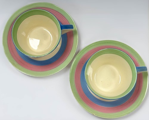 Lot 28 - Clarice Cliff Bizarre, a pair of 'Pastel Melon' conical cups and saucers